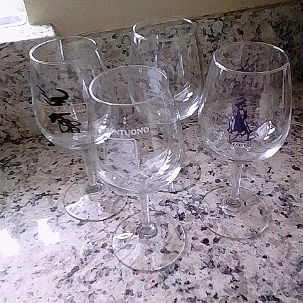 Set of 4 "matching" wine glasses from various wineries